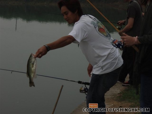 Assisting the lady angler, what a gentleman?